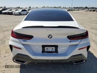 2023 BMW 8 Series M850i with VIN WBAGV8C0XPCK39846, listed as a Copart auction lot 61173594 with 0 mi miles and Salvage Title. Bid and sale history available at carsss.com. Image 6.