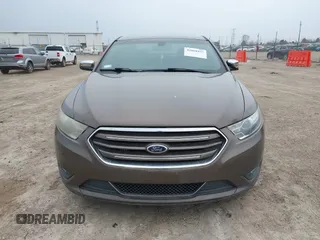 2015 Ford Taurus Limited with VIN 1FAHP2J84FG110702, listed as a IAAI auction lot 42060437 with 208,012 mi miles. Bid and sale history available at carsss.com. Image 12.