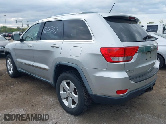 2011 Jeep Grand Cherokee Laredo with VIN 1J4RR4GG0BC622732, listed as a IAAI auction lot 42218785 with 127,186 mi miles and . Bid and sale history available at DreamBid. Image 3.