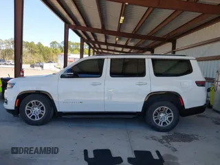 2023 Jeep Grand Wagoneer with VIN 1C4SJUAT5PS509425, listed as a IAAI auction lot 41765704 with 65,656 mi miles and . Bid and sale history available at DreamBid. Image 14.