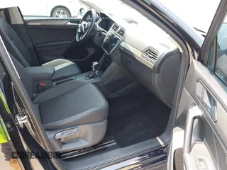 2023 Volkswagen Tiguan SE with VIN 3VVNB7AX5PM017938, listed as a IAAI auction lot 42453818 with 177,906 mi miles and . Bid and sale history available at DreamBid. Image 5.