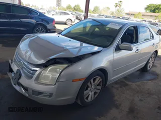 2008 Ford Fusion SEL with VIN 3FAHP08108R247080, listed as a IAAI auction lot 42015038 with 202,843 mi miles. Bid and sale history available at carsss.com. Image 2.