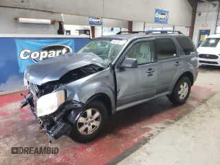 2010 Mercury Mariner z VIN 4M2CN9B70AKJ24170, wystawiony jako Copart lot #49241535 z przebiegiem 118 661 mil mil oraz Szkody całkowita. Historia ofert i sprzedaży dostępna na DreamBid. Obrazek 1.