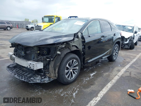 2021 Lexus RX with VIN 2T2HZMDA0MC274146, listed as a IAAI auction lot 41925284 with 67,064 mi miles. Bid and sale history available at carsss.com. Image 2.