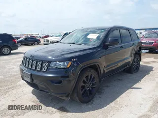 2019 Jeep Grand Cherokee Altitude with VIN 1C4RJEAG0KC857787, listed as a IAAI auction lot 42434646 with 193,968 mi miles and . Bid and sale history available at DreamBid. Image 2.
