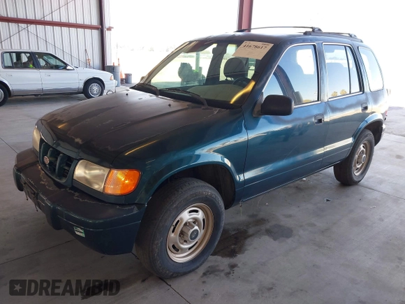 2000 Kia Sportage with VIN KNDJB7232Y5651398, listed as a IAAI auction lot 41678617 with 156,144 mi miles. Bid and sale history available at carsss.com. Image 2.