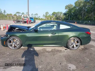 2021 BMW 4 Series 430i with VIN WBA53AP07MCG68388, listed as a IAAI auction lot 42198914 with 14,024 mi miles and . Bid and sale history available at DreamBid. Image 14.