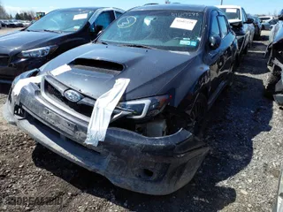 2011 Subaru Impreza Sedan WRX WRX Limited with VIN JF1GV7F65BG524345, listed as a IAAI auction lot 41607228 with 143,228 mi miles. Bid and sale history available at carsss.com. Image 2.