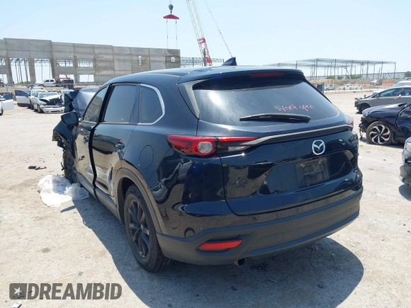 2021 Mazda CX-9 Touring with VIN JM3TCBCY8M0514905, listed as a IAAI auction lot 42385627 with 72,610 mi miles and . Bid and sale history available at DreamBid. Image 3.