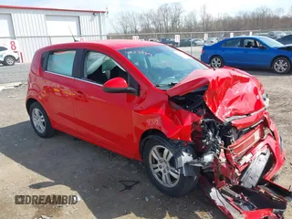 2012 Chevrolet Sonic LT with VIN 1G1JC6SH0C4182242, listed as a IAAI auction lot 42123434 with 115,077 mi miles and . Bid and sale history available at DreamBid. Image 1.