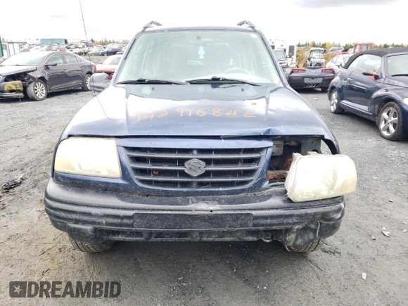 2004 Suzuki Vitara z VIN 2S3TD62VX46100019, wystawiony jako Copart lot #74291684 z przebiegiem 148 566 mil mil oraz Szkoda całkowita • Salvage title. Historia ofert i sprzedaży dostępna na DreamBid. Obrazek 5.