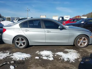 2014 BMW 3 Series 320i xDrive with VIN WBA3C3G51ENR25515, listed as a IAAI auction lot 41150558 with Not Provided miles. Bid and sale history available at carsss.com. Image 13.