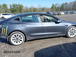2022 Tesla Model 3 Long Range with VIN 5YJ3E1EB0NF365284, listed as a IAAI auction lot 41899706 with 36,463 mi miles and . Bid and sale history available at DreamBid. Image 14.