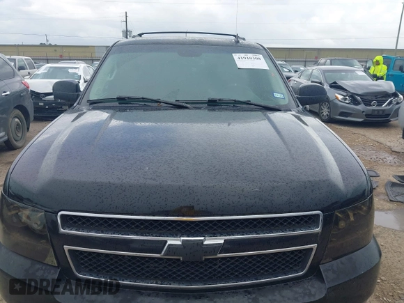 2007 Chevrolet Tahoe LTZ z VIN 1GNFK13047J377917, wystawiony jako IAAI lot #41910308 z przebiegiem 178 854 mil mil oraz . Historia ofert i sprzedaży dostępna na DreamBid. Obrazek 12.