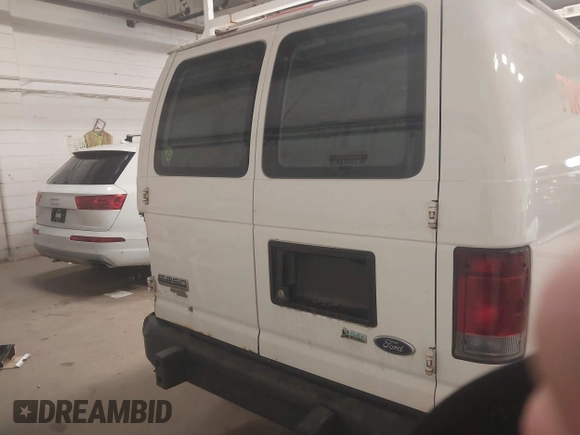 2012 Ford Econoline Cargo Recreational with VIN 1FTNE2EW4CDB03757, listed as a IAAI auction lot 42072612 with 147,153 mi miles. Bid and sale history available at carsss.com. Image 16.