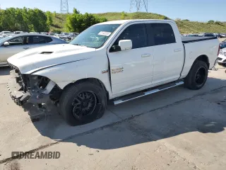 2016 Ram 1500 Sport with VIN 1C6RR6MTXGS242854, listed as a Copart auction lot 59940355 with 137,421 mi miles and Salvage title. Bid and sale history available at DreamBid. Image 1.
