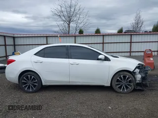 2019 Toyota Corolla L with VIN 5YFBURHE1KP937059, listed as a IAAI auction lot 41901278 with 98,796 mi miles and . Bid and sale history available at DreamBid. Image 14.