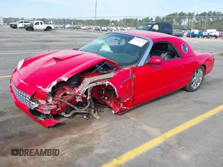 2002 Ford Thunderbird Hardtop Premium with VIN 1FAHP60A02Y130882, listed as a IAAI auction lot 41911737 with 18,521 mi miles and . Bid and sale history available at DreamBid. Image 2.
