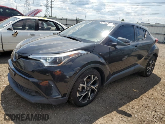 2018 Toyota C-HR XLE with VIN NMTKHMBX0JR014576, listed as a Copart auction lot 63263215 with 95,649 mi miles and Clean title. Bid and sale history available at DreamBid. Image 1.