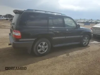 2006 Toyota Land Cruiser z VIN JTEHT05J262085007, wystawiony jako Copart lot #59312615 z przebiegiem 311 264 mil mil oraz Czysty tytuł • Clean title. Historia ofert i sprzedaży dostępna na DreamBid. Obrazek 3.
