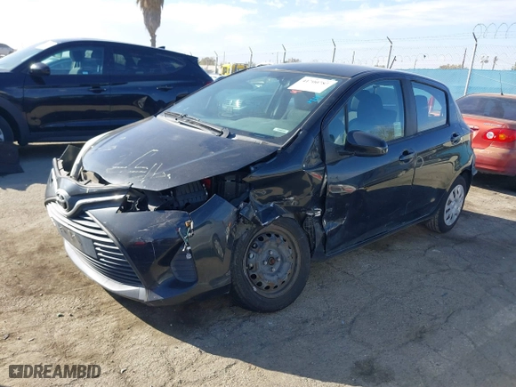 2015 Toyota Yaris L with VIN VNKKTUD34FA038840, listed as a IAAI auction lot 41700783 with 106,628 mi miles. Bid and sale history available at carsss.com. Image 18.