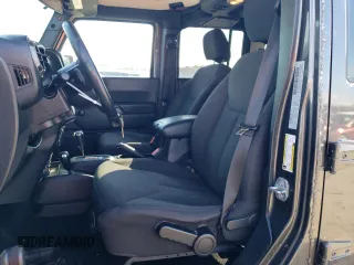 2018 Jeep Wrangler JK Unlimited Sport with VIN 1C4BJWDG9JL894502, listed as a Copart auction lot 89360855 with 100,944 mi miles and Salvage Title. Bid and sale history available at carsss.com. Image 7.
