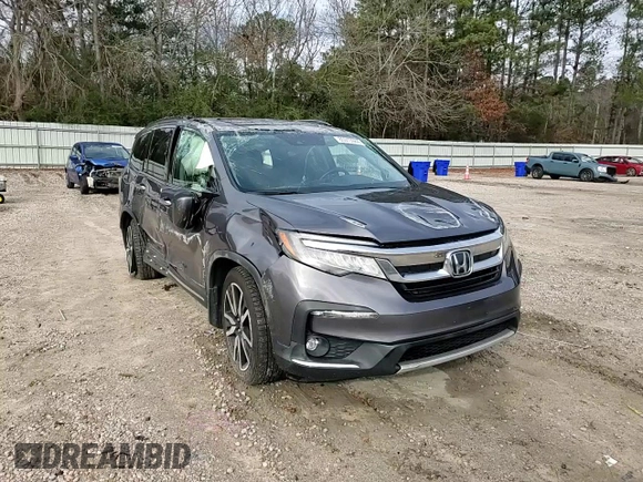 2020 Honda Pilot Touring 8-Passenger with VIN 5FNYF5H91LB004386, listed as a Copart auction lot 85913984 with 54,692 mi miles and Salvage Title. Bid and sale history available at DreamBid. Image 11.