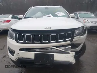 2019 Jeep Compass Latitude with VIN 3C4NJDBB6KT847829, listed as a IAAI auction lot 41476956 with 58,423 mi miles. Bid and sale history available at carsss.com. Image 12.
