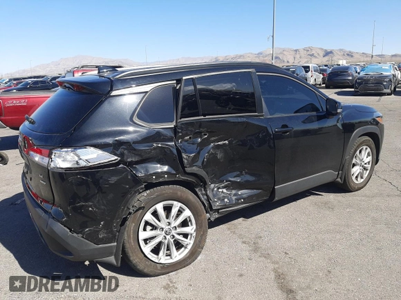 2022 Toyota Corolla Cross LE with VIN 7MUCAABG1NV033299, listed as a Copart auction lot 58018825 with 28,138 mi miles and Salvage title. Bid and sale history available at DreamBid. Image 3.