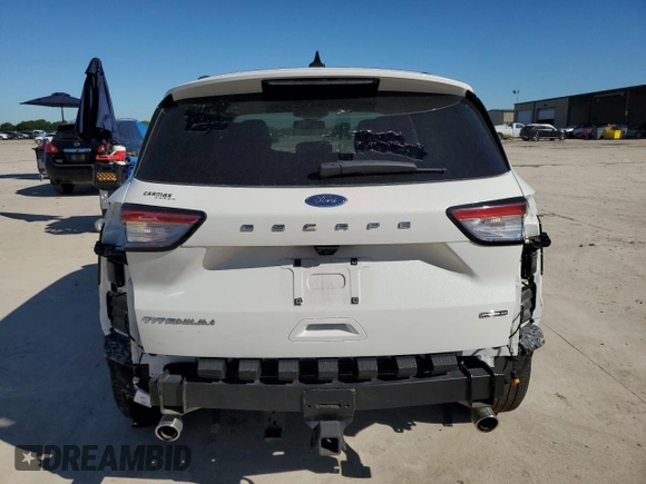 2021 Ford Escape Titanium Hybrid with VIN 1FMCU9DZ9MUA02709, listed as a Copart auction lot 56355255 with 30,571 mi miles and Salvage title. Bid and sale history available at DreamBid. Image 6.