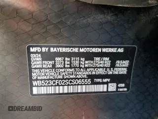 2025 BMW iX xDrive50 z VIN WB523CF02SCS06555, wystawiony jako Copart lot #55291115 z przebiegiem Nie podano mil oraz Szkoda całkowita • Salvage title. Historia ofert i sprzedaży dostępna na DreamBid. Obrazek 13.