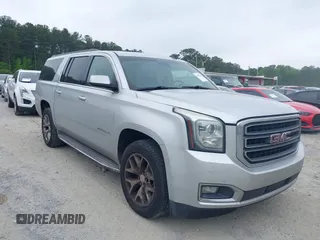 2015 GMC Yukon XL SLT with VIN 1GKS1HKC2FR251672, listed as a IAAI auction lot 42152312 with 232,736 mi miles and . Bid and sale history available at carsss.com. Image 1.