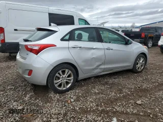 2013 Hyundai Elantra GT with VIN KMHD35LEXDU061377, listed as a Copart auction lot 79476674 with 123,503 mi miles and Salvage Title. Bid and sale history available at carsss.com. Image 3.