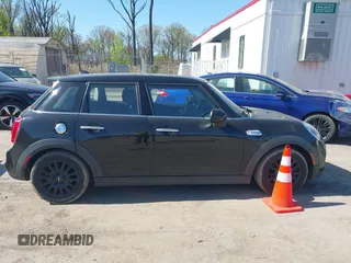 2016 MINI Hardtop 4 Door S z VIN WMWXU3C51G2D29400, wystawiony jako IAAI lot #42064309 z przebiegiem 85 021 mil mil oraz . Historia ofert i sprzedaży dostępna na DreamBid. Obrazek 13.