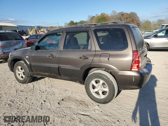 2006 Mazda Tribute S with VIN 4F2YZ04116KM23873, listed as a Copart auction lot 79926084 with 67,142 mi miles and Salvage Title. Bid and sale history available at DreamBid. Image 2.