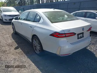 2024 BMW 5 Series 530i xDrive with VIN WBA53FJ06RCR29262, listed as a IAAI auction lot 42157428 with 27,918 mi miles and . Bid and sale history available at DreamBid. Image 3.