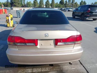 2001 Honda Accord EX z VIN JHMCG66801C010759, wystawiony jako IAAI lot #42303890 z przebiegiem 216 143 mil mil oraz . Historia ofert i sprzedaży dostępna na DreamBid. Obrazek 16.