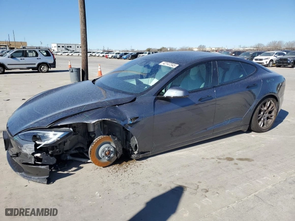 2023 Tesla Model S with VIN 5YJSA1E5XPF516118, listed as a Copart auction lot 42147345 with 12,564 mi miles and Salvage Title. Bid and sale history available at carsss.com. Image 1.