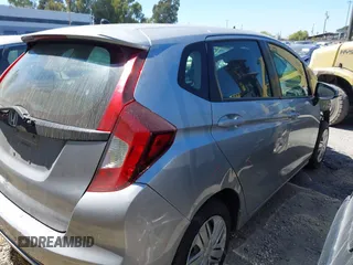 2019 Honda Fit LX z VIN 3HGGK5H42KM733455, wystawiony jako IAAI lot #42644157 z przebiegiem 51 036 mil mil oraz . Historia ofert i sprzedaży dostępna na DreamBid. Obrazek 4.