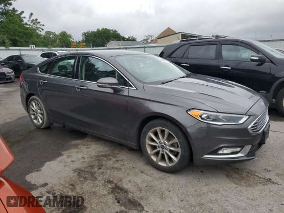 2017 Ford Fusion SE z VIN 3FA6P0HDXHR122962, wystawiony jako Copart lot #64964565 z przebiegiem 139 005 mil mil oraz Czysty tytuł • Clean title. Historia ofert i sprzedaży dostępna na DreamBid. Obrazek 4.