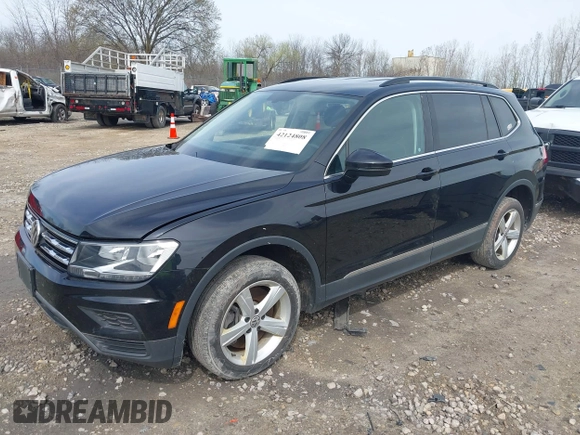 2021 Volkswagen Tiguan SE with VIN 3VV2B7AX4MM050282, listed as a IAAI auction lot 42124808 with 80,082 mi miles and . Bid and sale history available at DreamBid. Image 18.
