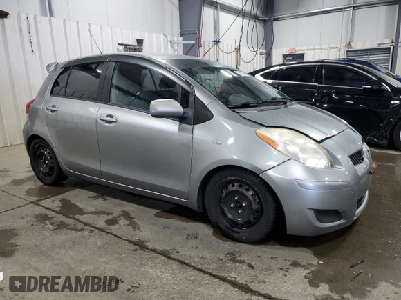 2009 Toyota Yaris with VIN JTDKT903X95231860, listed as a Copart auction lot 51908185 with 135,701 mi miles and Salvage Title. Bid and sale history available at carsss.com. Image 4.