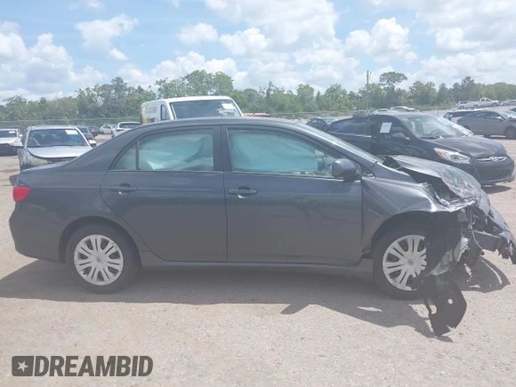 2009 Toyota Corolla with VIN 1NXBU40E39Z067256, listed as a IAAI auction lot 41943961 with 144,659 mi miles. Bid and sale history available at carsss.com. Image 14.