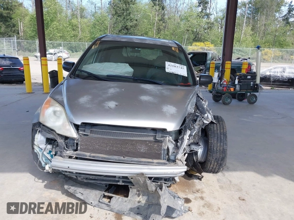 2007 Honda CR-V EX z VIN JHLRE48587C101668, wystawiony jako IAAI lot #42183745 z przebiegiem 173 469 mil mil oraz . Historia ofert i sprzedaży dostępna na DreamBid. Obrazek 13.