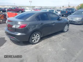 2010 Mazda 3 i Touring with VIN JM1BL1SG6A1251147, listed as a IAAI auction lot 42041631 with Not Provided miles. Bid and sale history available at carsss.com. Image 4.