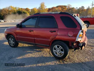 2005 Kia Sportage LX with VIN KNDJE723X57054667, listed as a Copart auction lot 77134794 with 159,748 mi miles and Salvage Title. Bid and sale history available at carsss.com. Image 2.