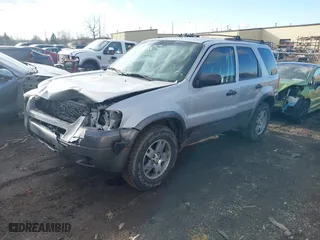 2003 Ford Escape XLT Popular 2 with VIN 1FMCU93153KA91250, listed as a IAAI auction lot 41700796 with 122,172 mi miles. Bid and sale history available at carsss.com. Image 2.