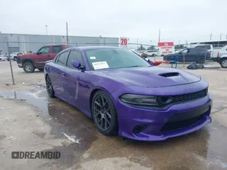 2019 Dodge Charger Scat Pack with VIN 2C3CDXGJ4KH726312, listed as a IAAI auction lot 40472053 with 23,099 mi miles and . Bid and sale history available at DreamBid. Image 1.