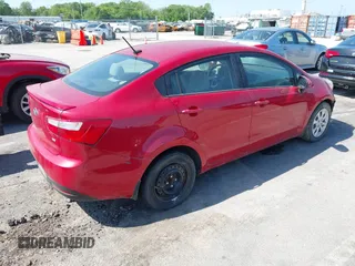 2014 Kia Rio LX with VIN KNADM4A32E6334330, listed as a IAAI auction lot 42239542 with 134,314 mi miles and . Bid and sale history available at DreamBid. Image 4.