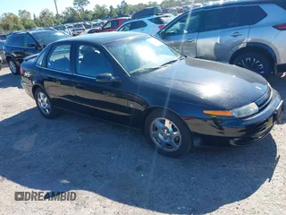 2002 Saturn LS z VIN 1G8JW54R12Y582620, wystawiony jako IAAI lot #40958704 z przebiegiem 97 256 mil mil oraz . Historia ofert i sprzedaży dostępna na DreamBid. Obrazek 1.